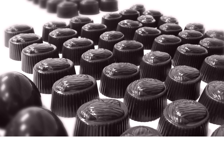 Chocolate truffles left to set on trays